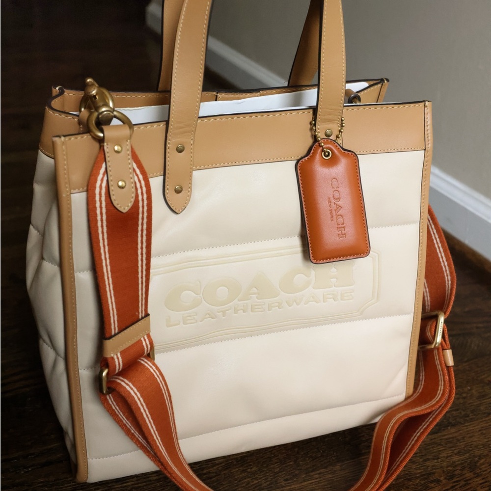 I am selling my brand new Coach Tote bag in the color: Tan & Cream.